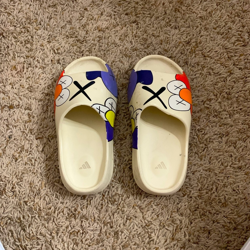 Yeezy slides x KAWS